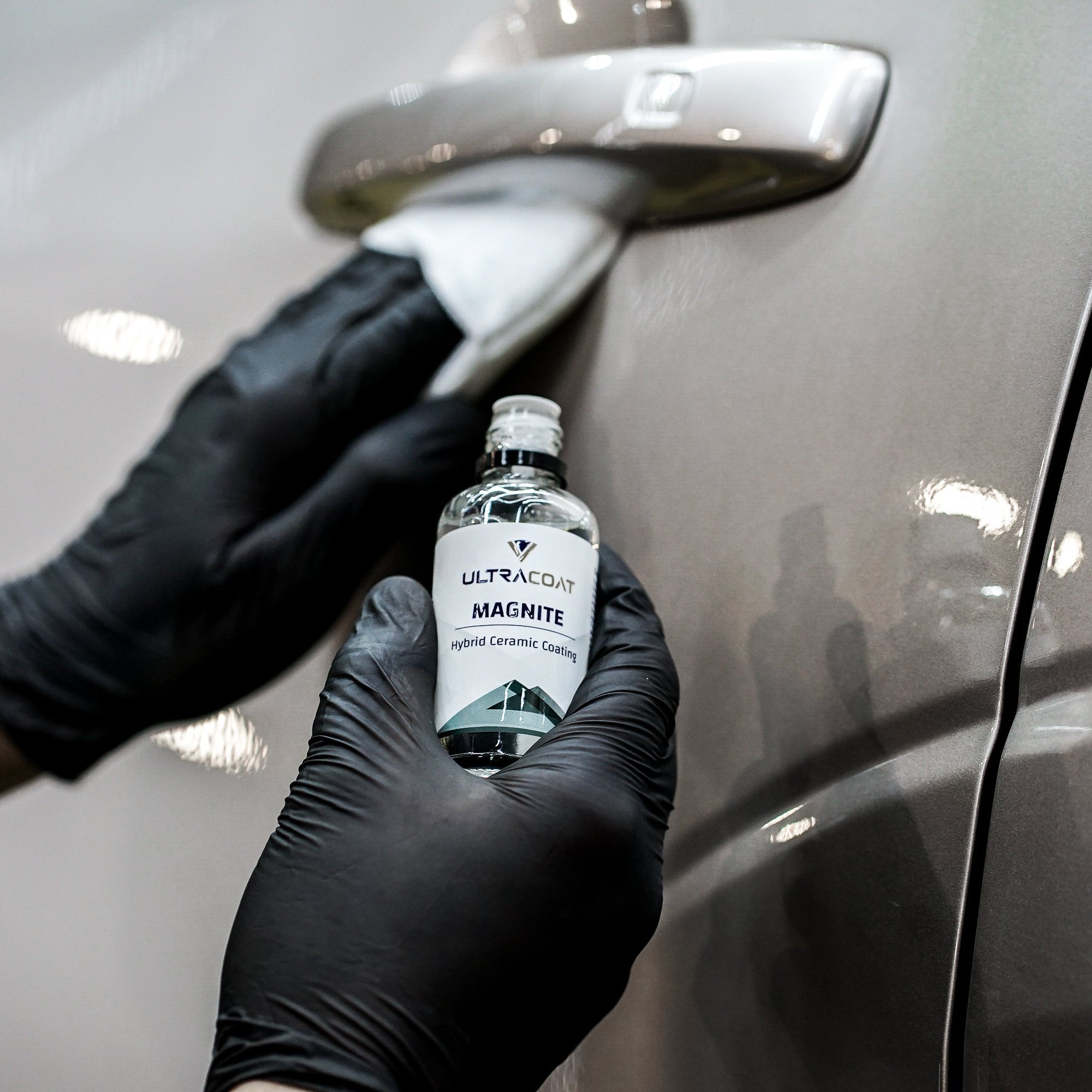ULTRACOAT Magnite bottle during application on automotive paint