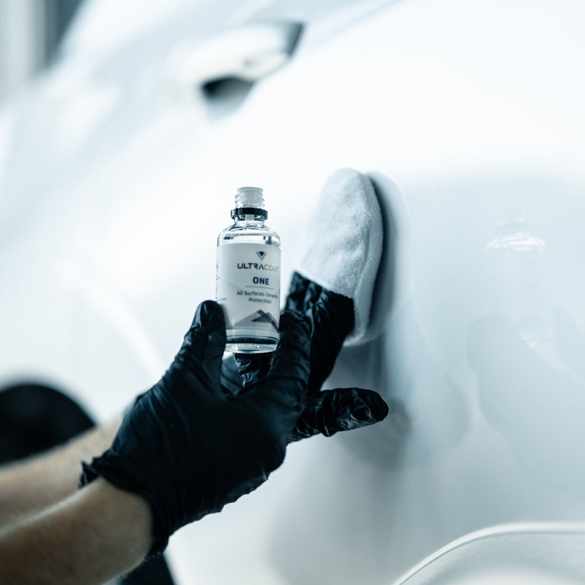 ULTRACOAT One bottle during coating application on automotive paint