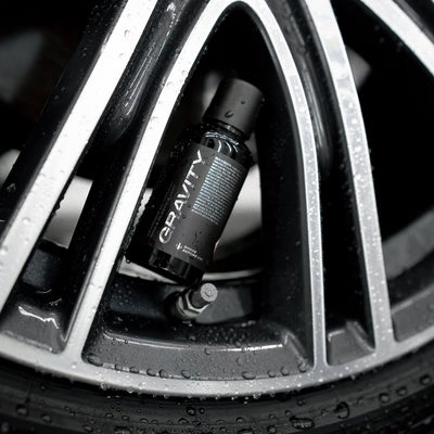 ULTRACOAT Gravity bottle displayed inside an alloy wheel