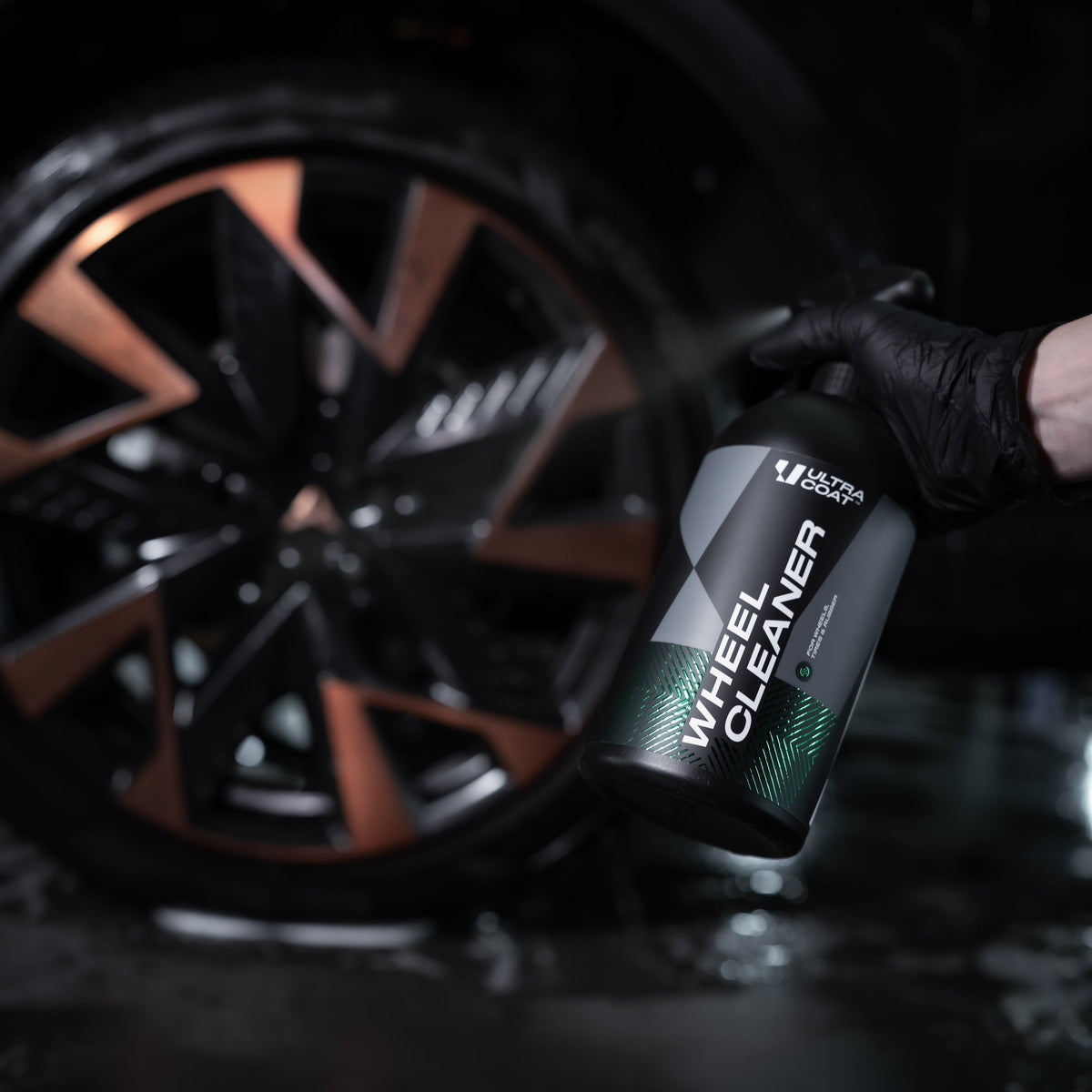 ULTRACOAT Wheel Cleaner bottle during alloy wheel cleaning